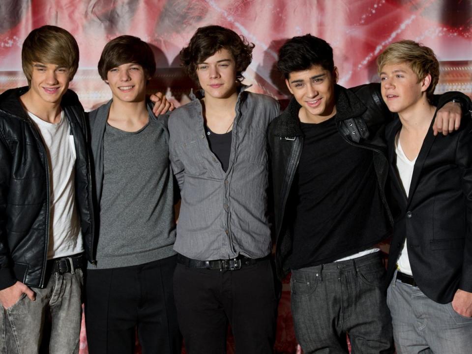 One Direction form (2010): Of Simon Cowell’s many contributions to civilisation – see also Jedward, Susan Boyle and Piers Morgan’s career in America – surely the most enduring will be the alliance of Harry, Niall, Louis, Zayn and… the other one (sorry, hi Liam…we’ve just remembered you). It was during the 2010 run of The X Factor that Cowell decided to assemble a Voltron-like pop behemoth out of five skinny teens slathered in Brylcreem. What followed was the 21st-century version of The Beatles, with better hair, tighter trousers and not a single memorable tune (go on, hum one – we dare you). (Getty Images)