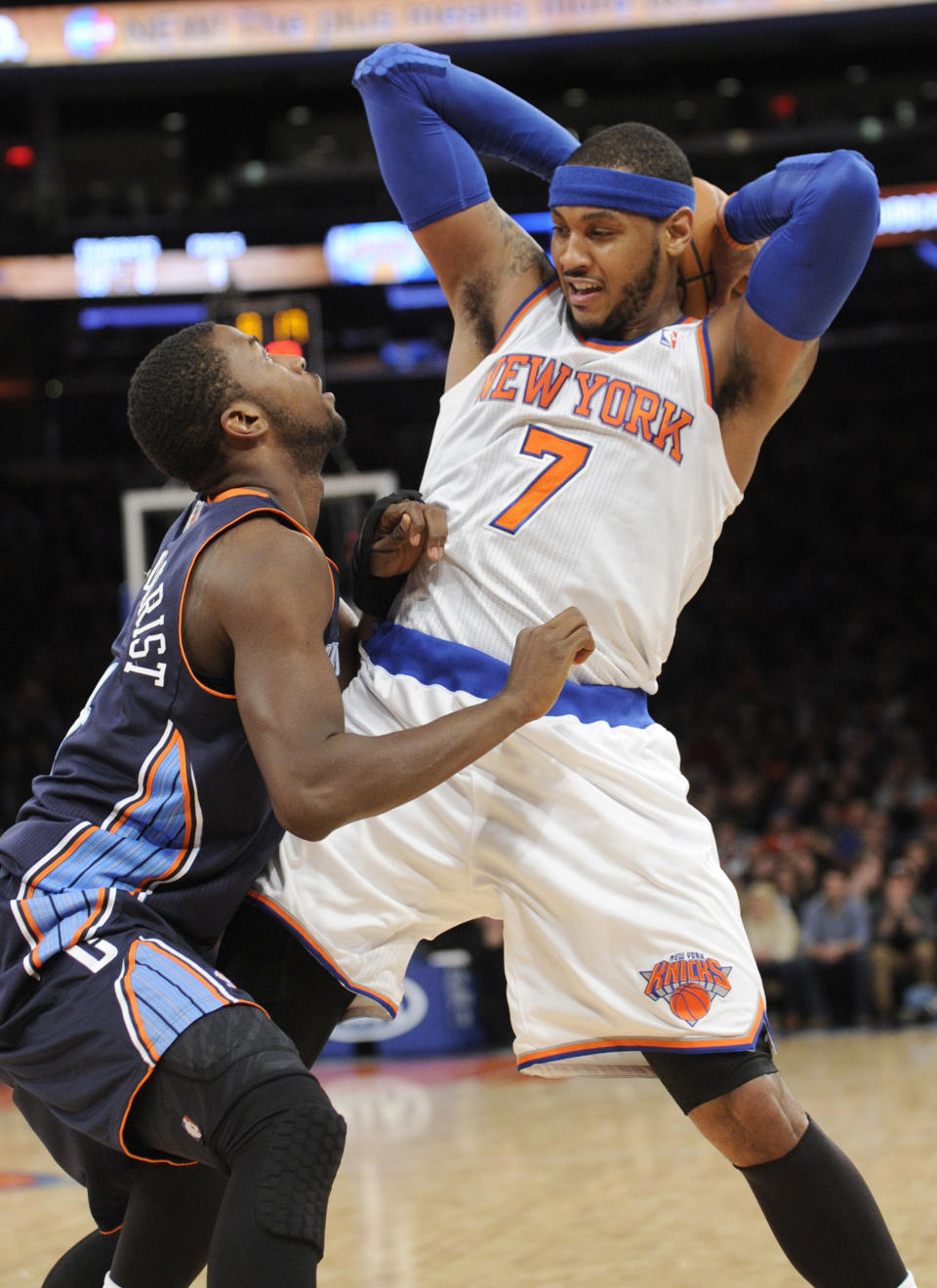 New York Knicks' Carmelo Anthony, right, makes a move as he is guarded by Charlotte Bobcats' Michael Kidd-Gilchrist during the second quarter of an NBA basketball game, Friday, Jan. 24, 2014, at Madison Square Garden in New York. Anthony scored 62 points as the Knicks defeated the Bobcats 125-96. (AP Photo/Bill Kostroun)