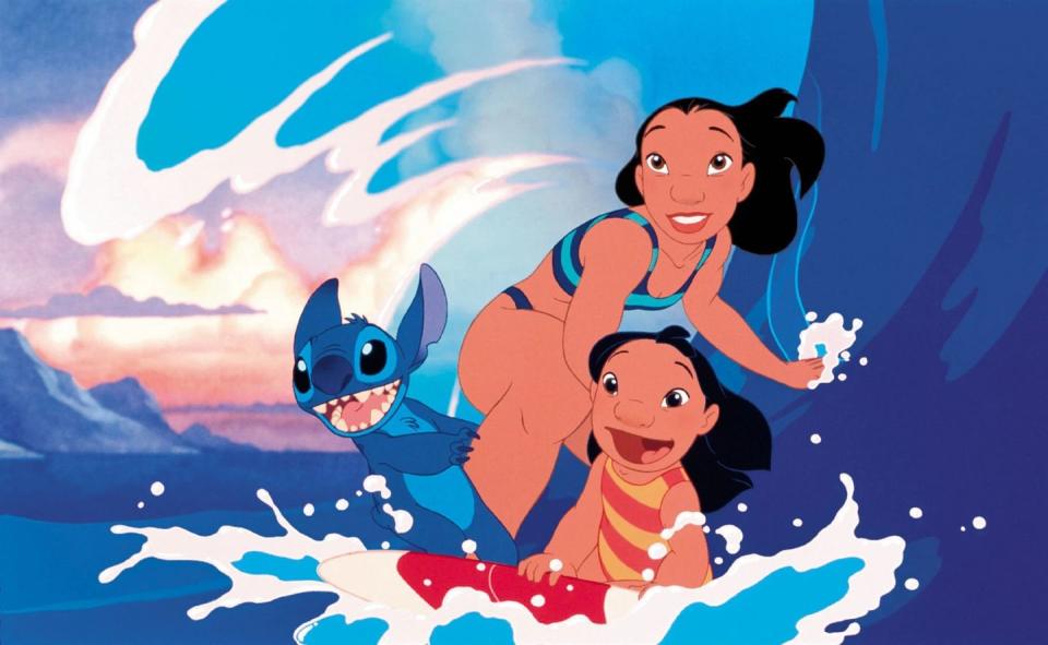 lilo and stitch, with the duo and nani surfing a wave on a board