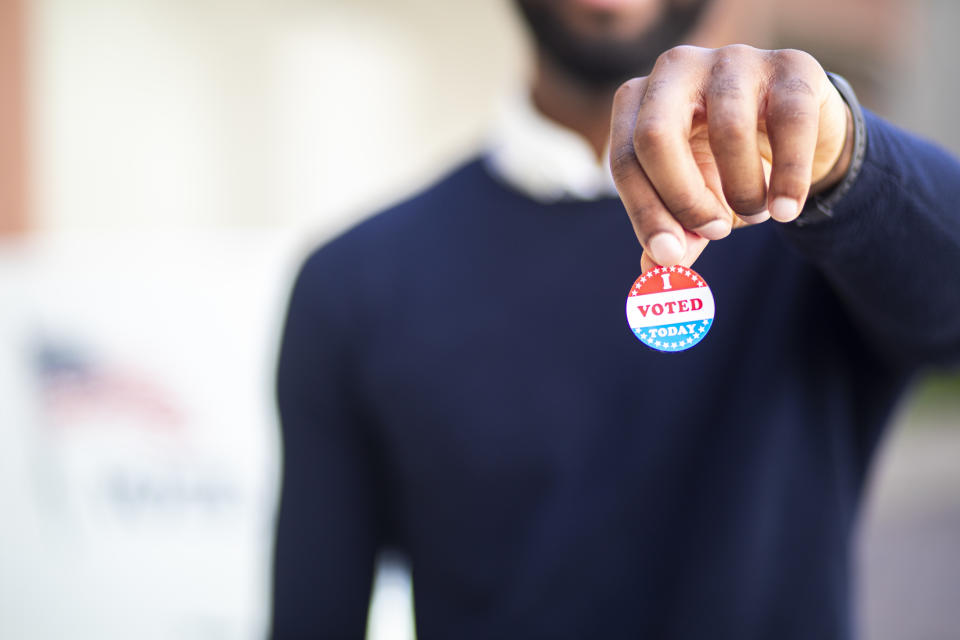 A voting sticker is fine — but campaign badges are best left out of sight. (Photo: Getty Images stock photo)