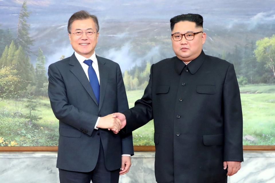 South Korean President Moon Jae-in shakes hands with North Korean leader Kim Jong-un: REUTERS