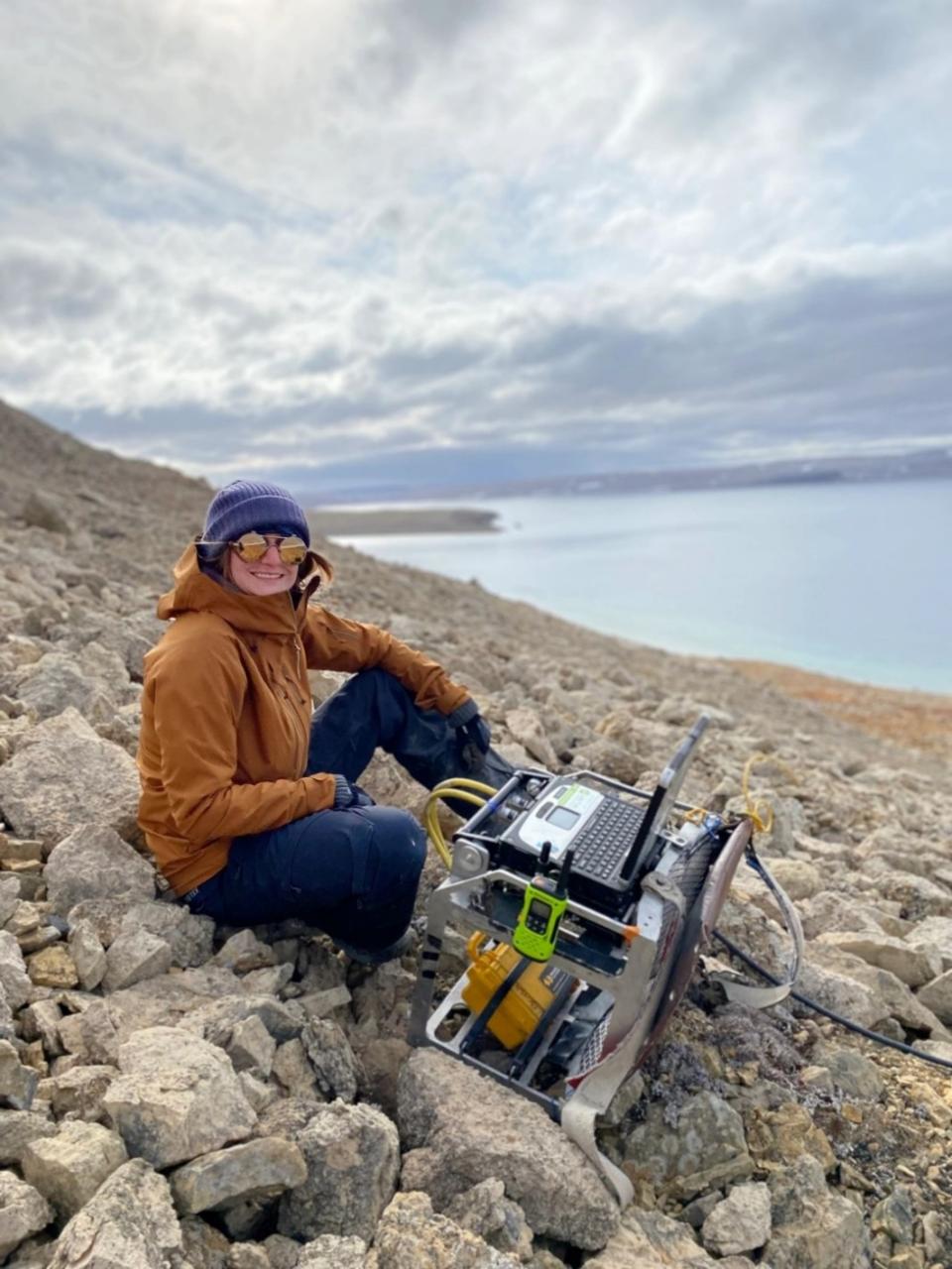 <i>Figure 1: Electromagnetic survey field crew taking sensor readings.</i>