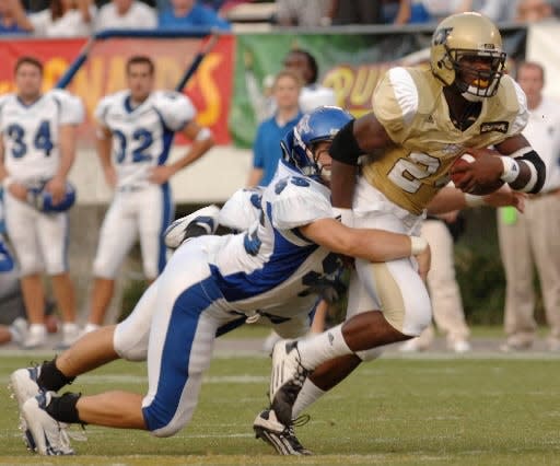 Kevin Smith challenged Barry Sanders' NCAA single-season rushing record in 2007, and led UCF to its first Conference USA title.