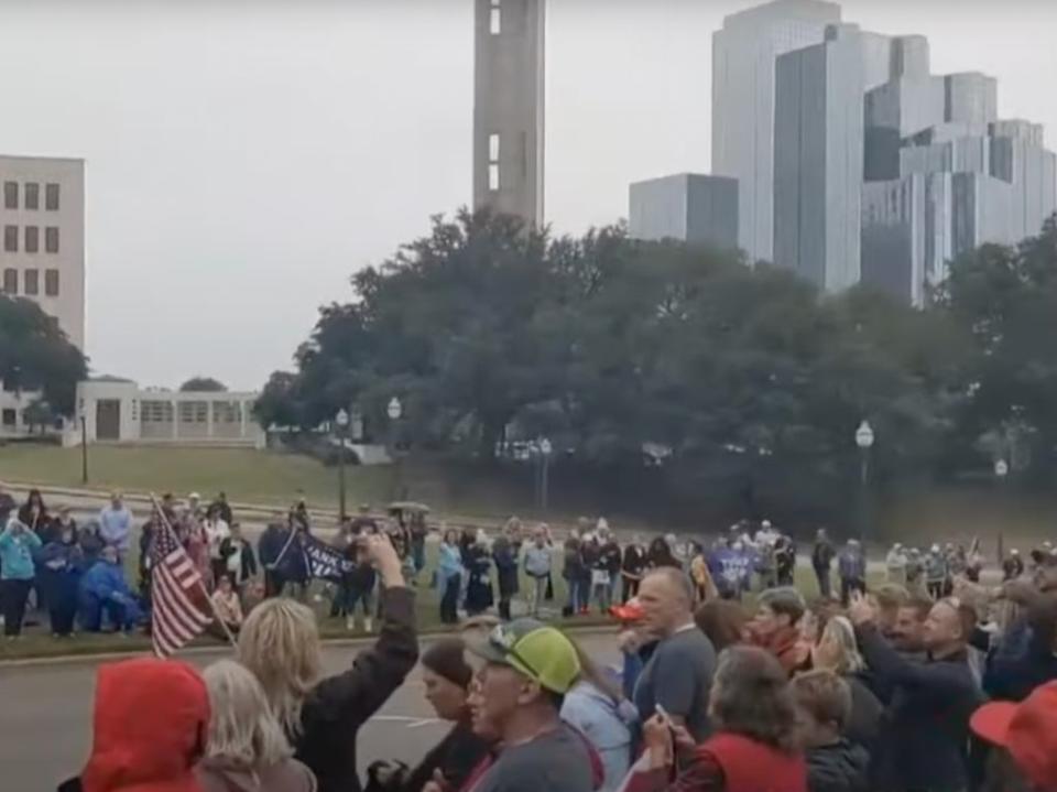 The crowds gathered at Dealey Plaza in Dallas, Texas, on Tuesday (YouTube/AFP)