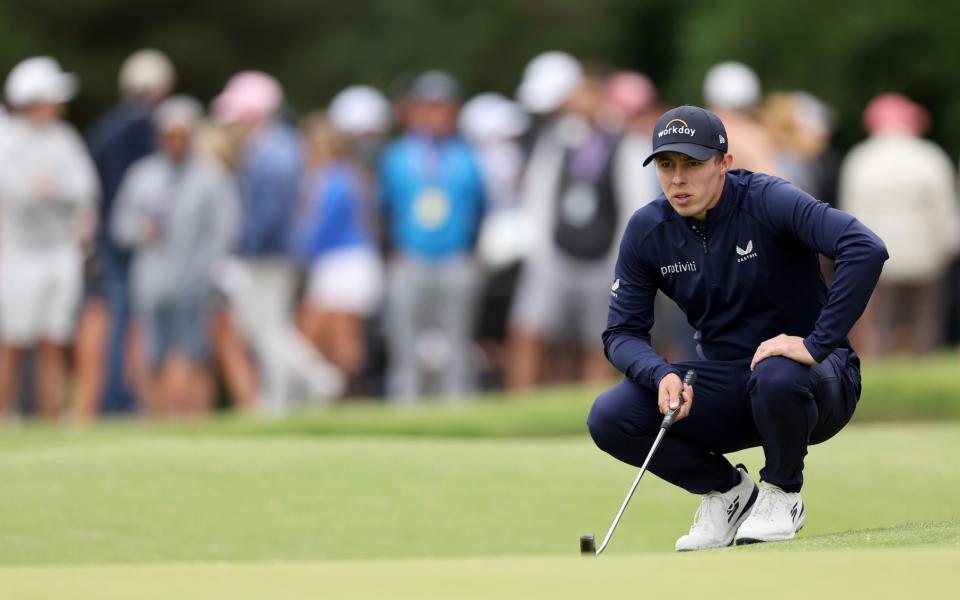 Matt Fitzpatrick of England lines up a putt on the 16th green during the third round - GETTY IMAGES