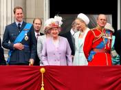 <p>Queen Elizabeth II laughs along with her grandson Prince William and her husband the Duke of Edinburgh as they watch a flypast from the balcony of Buckingham Palace, following the Trooping the Colour ceremony at Horse Guards Parade. (Dominic Lipinski/PA Wire) </p>