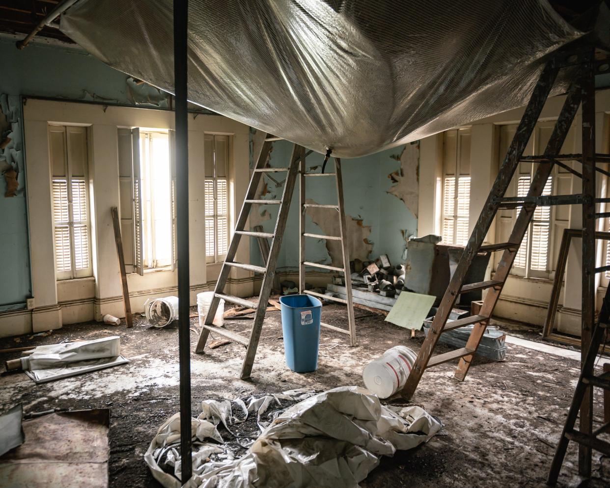 A interior view of water damage inside No. 1 Rutger Park in Utica on Friday, April 19, 2024.