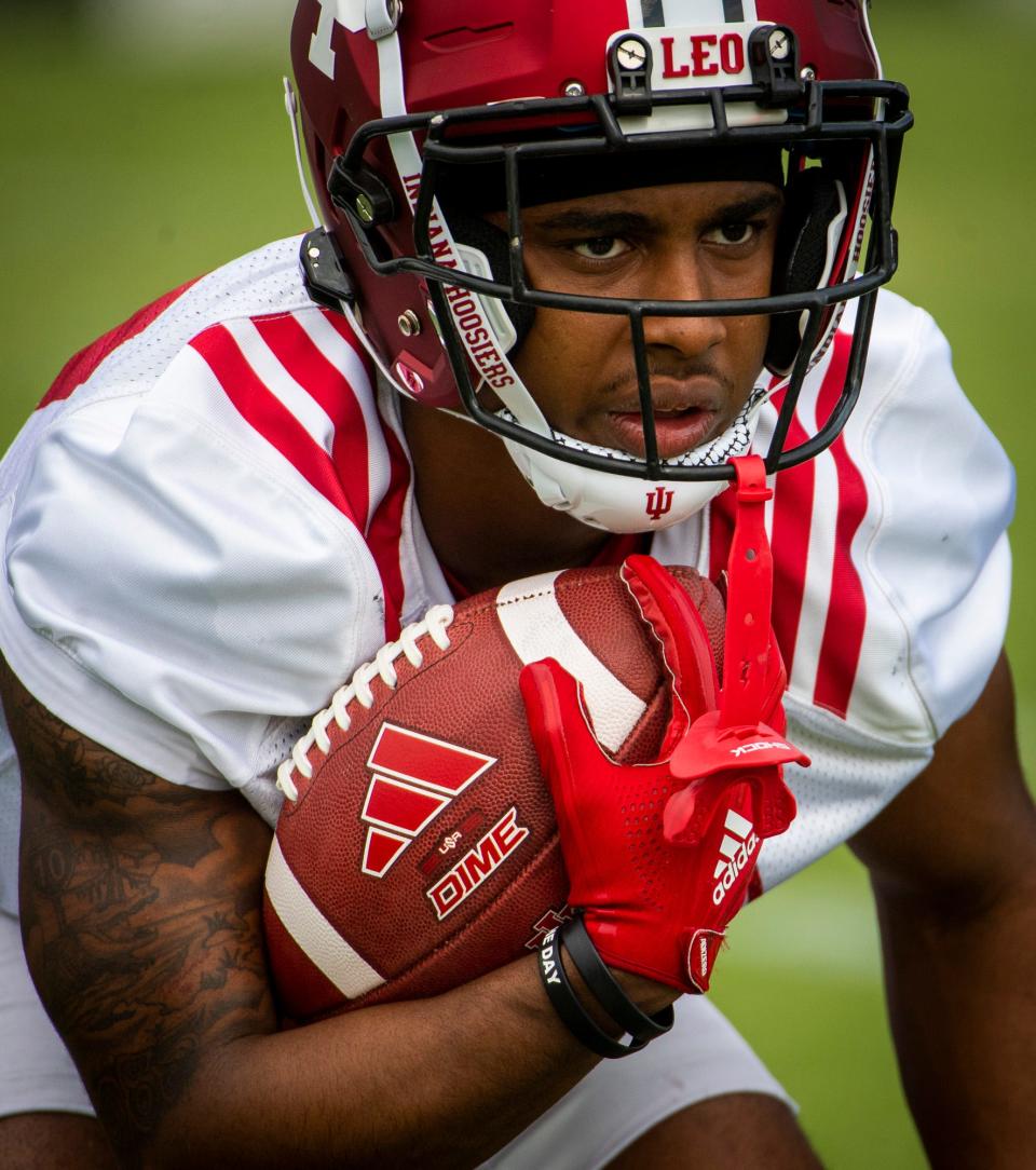 Indiana's Jaylin Lucas (12) runs during a drill during the first day of fall camp for Indiana football at their practice facilities on Wednesday, Aug. 2, 2023.