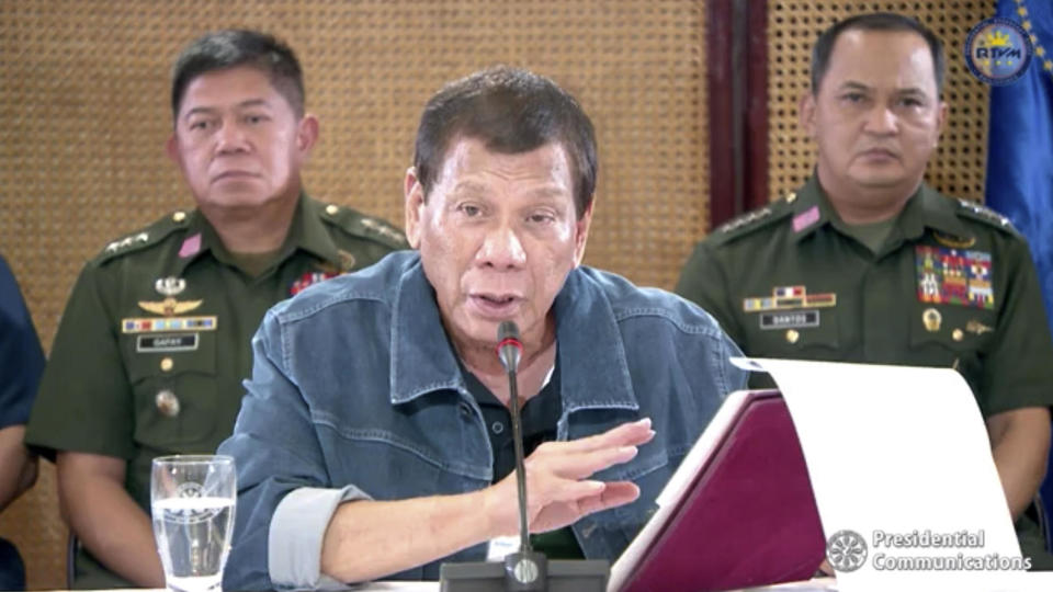 Philippine President Rodrigo Duterte gestures during a speech at the Malacanang presidential palace in Manila, Philippines, in this March 12, 2020 file photo. / Credit: RTVM via AP