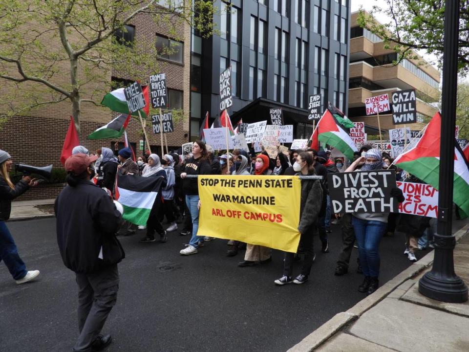 Pro-Palestine protesters march through downtown State College and the Penn State campus on Saturday afternoon for many of the same demands they made during a Thursday protest — including for Penn State to divest from Israel and to free Palestine. Halie Kines/hkines@centredaily.com