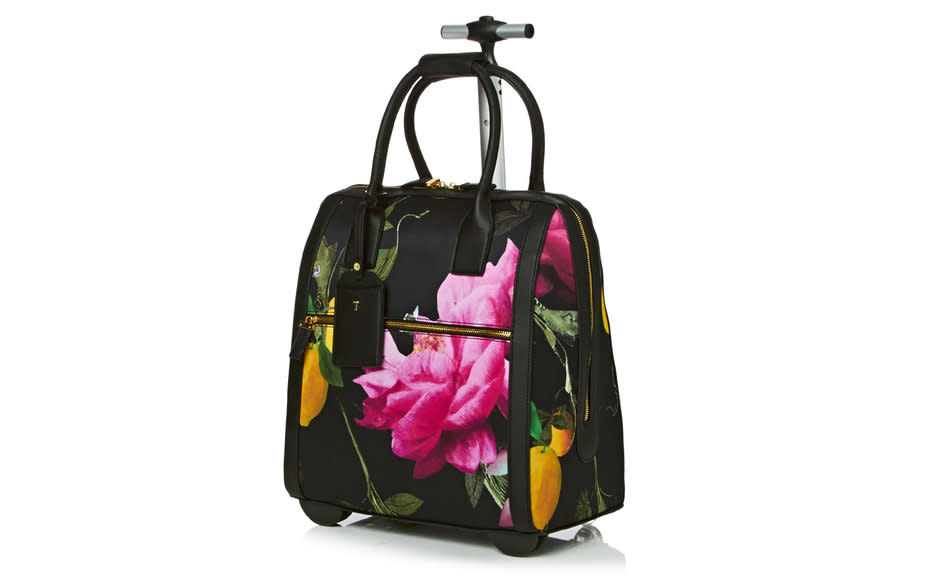 <p>Bloomingdale's is offering Cyber Monday shoppers 25 percent off across the sitetime to stock up on travel essentials!</p><p>Our pick: <a rel="nofollow noopener" href="http://click.linksynergy.com/fs-bin/click?id=93xLBvPhAeE&subid=0&offerid=465536.1&type=10&tmpid=2425&RD_PARM1=http%3A%2F%2Fwww1.bloomingdales.com%2Fshop%2Fproduct%2Fted-baker-katena-citrus-bloom-travel-bag%3FID%3D1749445%2526CategoryID%3D&u1=TLCYBERMONDAYDEALS" target="_blank" data-ylk="slk:Ted Baker Rolling Suitcase;elm:context_link;itc:0;sec:content-canvas" class="link ">Ted Baker Rolling Suitcase</a></p>