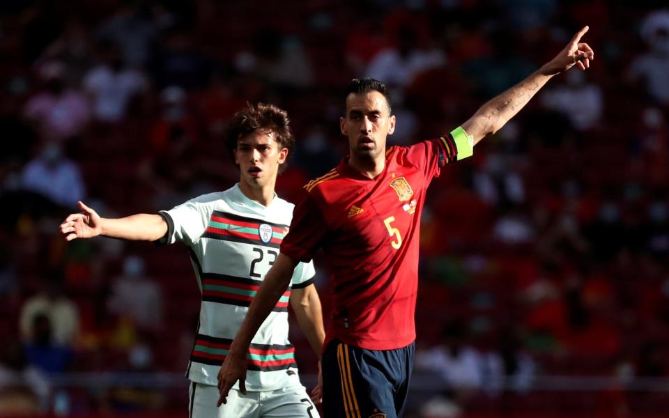  Spain's midfielder Sergio Busquets (R) and Portugal's striker Joao Felix (L) during the international friendly soccer match between Spain and Portugal at Wanda Metropolitano stadium in Madrid, Spain - SHUTTERSTOCK