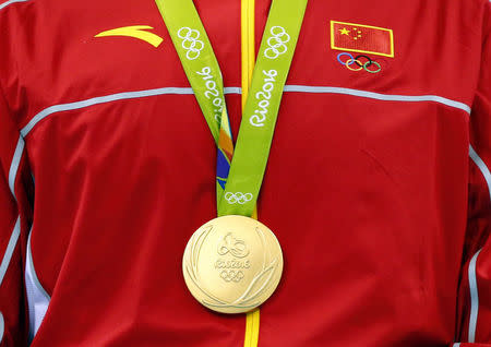 The gold medal for men's 200m freestyle is pictured on Sun Yang of China. REUTERS/David Gray