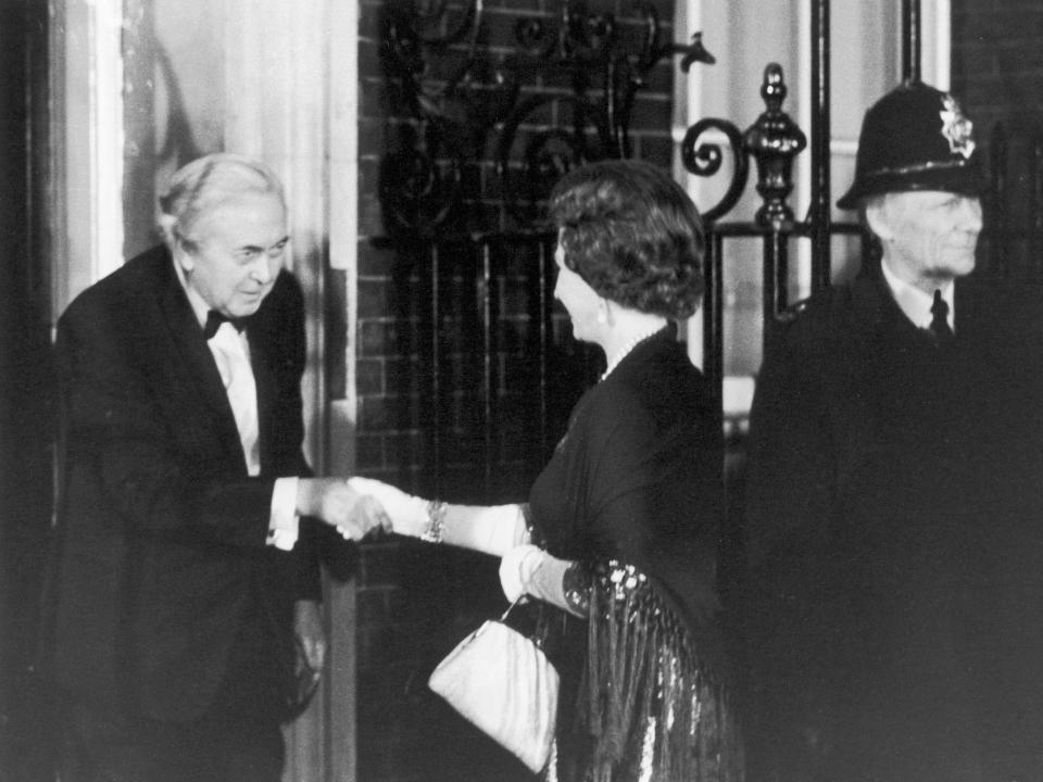 Harold Wilson and Queen Elizabeth shaking hands outside of 10 Downing Street