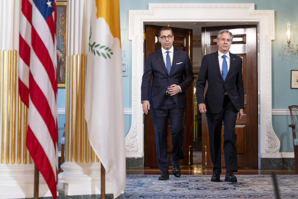 Secretary of State Antony Blinken, right, walks with Cyprus' Foreign Minister Constantinos Kombos, Monday, June 17, 2024, at the State Department in Washington. (AP Photo/Jacquelyn Martin)