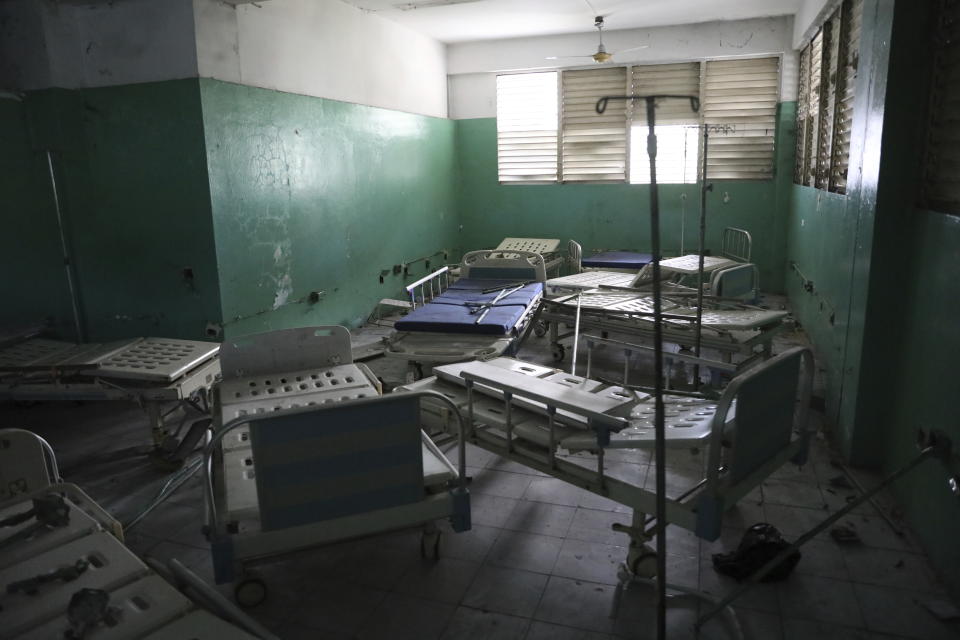 The emergency room of the General Hospital is empty during a visit by Haitian Prime Minister Garry Conille in Port-au-Prince, Haiti, Tuesday, July 9, 2024. Haiti's prime minister and police chief visited the capital's largest hospital after authorities announced that police took control of the medical institution over the weekend from armed gangs. (AP Photo/Odelyn Joseph)