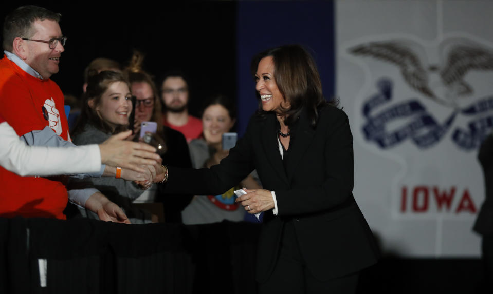 2020 Democratic presidential candidate Sen. Kamala Harris greets audience members during a town hall meeting at the University of Iowa, Wednesday, April 10, 2019, in Iowa City, Iowa. (AP Photo/Charlie Neibergall)