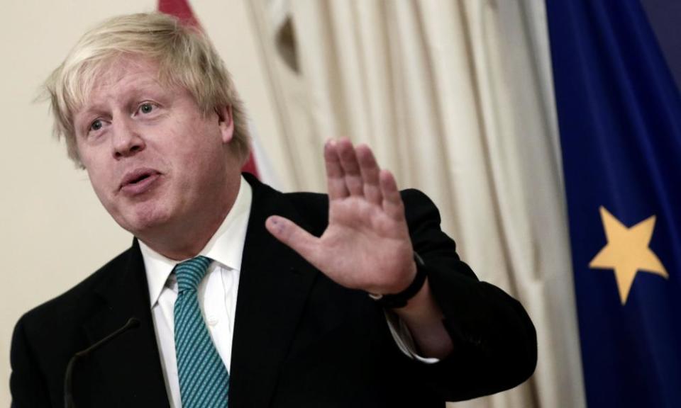 Boris Johnson answers a question during a joint press conference with the Greek foreign minister.