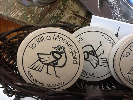 Drink coasters are shown for sale in the gift shop of the Monroe County Heritage Museum in Monroeville, Alabama October 23, 2013. REUTERS/Verna Gates