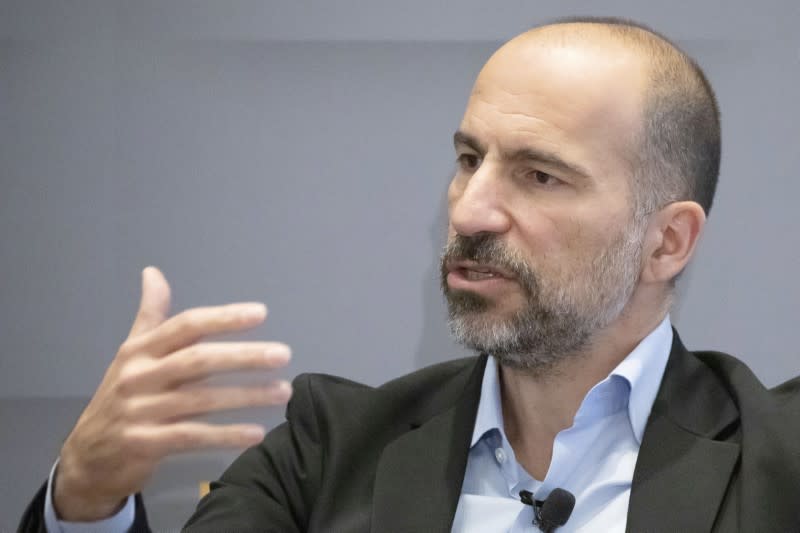 Uber CEO Dara Khosrowshahi gestures as he speaks during a meeting with the Economic Club of New York in New York City