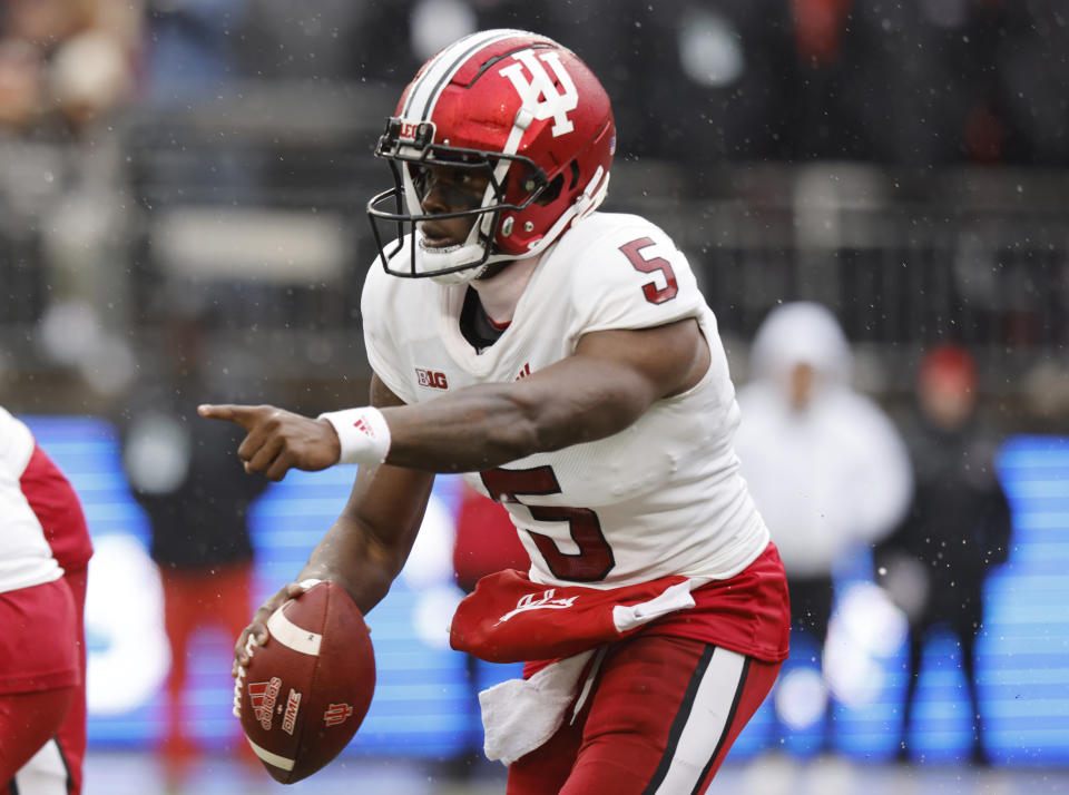 Indiana quarterback Dexter Williams directs his team against Ohio State during the first half of an NCAA college football game Saturday, Nov. 12, 2022 in Columbus, Ohio. (AP Photo/Paul Vernon)