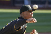 Pittsburgh Pirates starter Johan Oviedo pitches against the St. Louis Cardinals during the first inning of a baseball game, Wednesday, Oct. 5, 2022, in Pittsburgh. (AP Photo/Keith Srakocic)