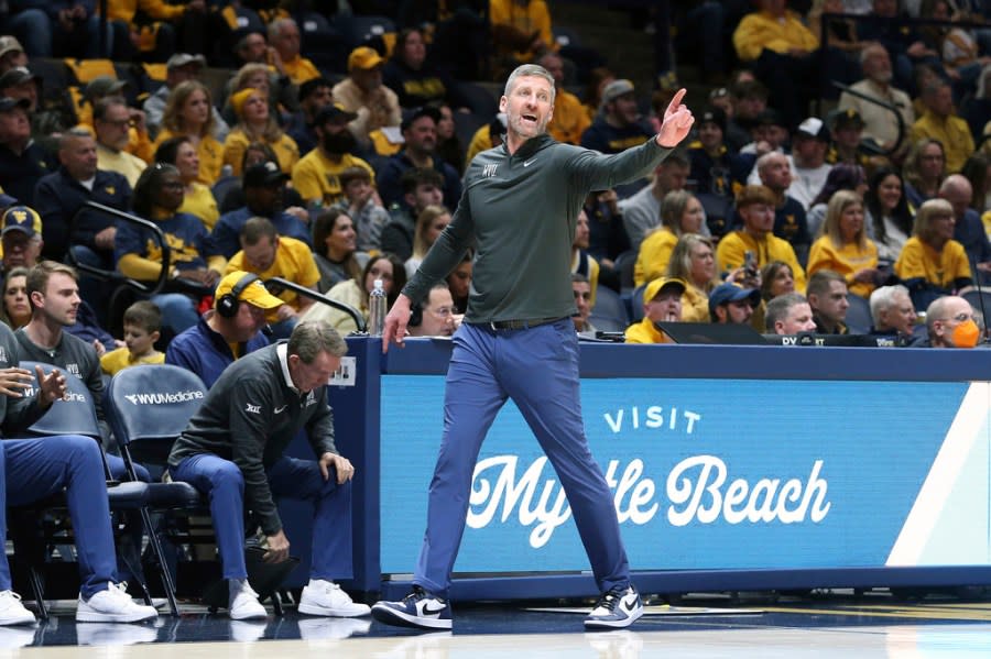 West Virginia coach Josh Eilert reacts during the second half of an NCAA college basketball game against Texas on Saturday, Jan. 13, 2024, in Morgantown, W.Va. (AP Photo/Kathleen Batten)