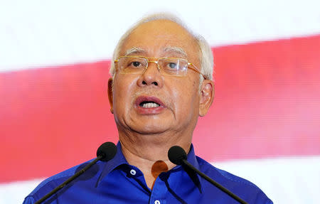 Malaysia's outgoing Prime Minister Najib Razak speaks at a news conference following the general election in Kuala Lumpur, Malaysia, May 10, 2018. REUTERS/Athit Perawongmetha