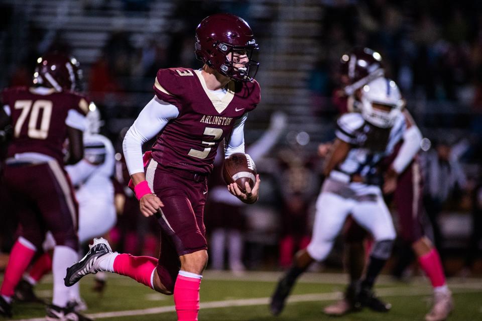 Arlington's Michael Rescigno drives upfield during the Section 1 Class AA quarterfinal at Arlington High School in Freedom Plains on Friday. Arlington defeated New Rochelle 40-29. KELLY MARSH/FOR THE POUGHKEEPSIE JOURNAL