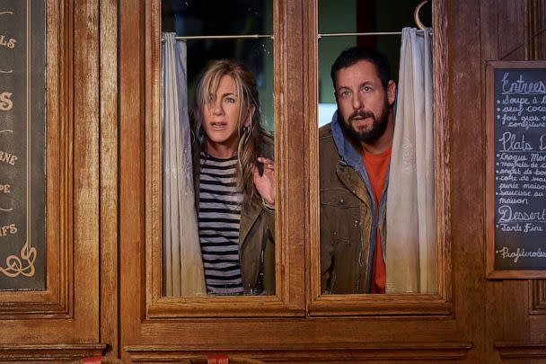 PHOTO: Jennifer Aniston, as Audrey Spitz, and Adam Sandler, as Nick Spitz, in 'Murder Mystery 2.' (Scott Yamano/Netflix)