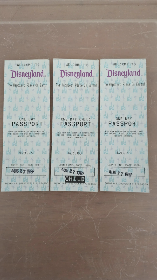 Three vintage Disneyland "Magic Kingdom Club" tickets, two adult, one child from 1989