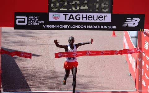 Eliud Kipchoge crossing the finish line - Credit: GETTY IMAGES