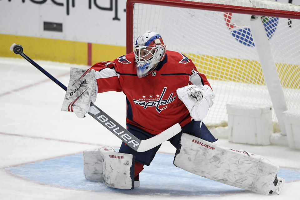 Washington Capitals goaltender Vitek Vanecek (41) stops the puck during the third period of an NHL hockey game against the Buffalo Sabres, Friday, Jan. 22, 2021, in Washington. (AP Photo/Nick Wass)