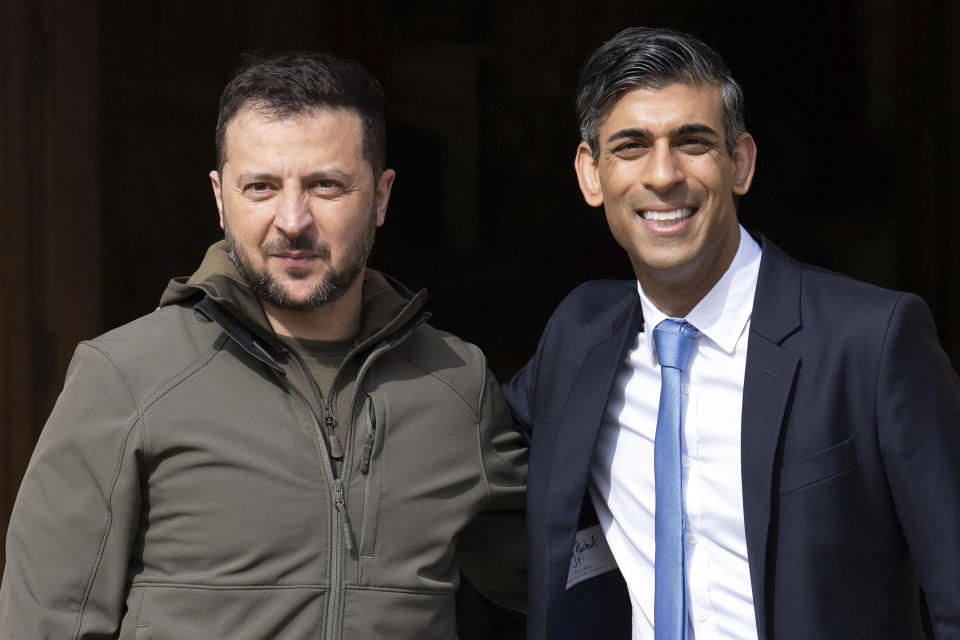 FILE - Britain's Prime Minister Rishi Sunak, right, receives Ukraine's President Volodymyr Zelenskyy at Chequers, the prime minister's official country residence, in Aylesbury, England, Monday, May 15, 2023. While the world awaits Ukraine's spring offensive, its leader Volodymyr Zelenskyy has already launched a diplomatic one. In a span of a week, he has dashed to Italy, the Vatican, Germany, France and Britain to shore up support for the defense of his country. On Friday, May 19, 2023, he was in Saudi Arabia to meet with Arab leaders, some of whom are allies with Moscow. (Carl Court/Pool via AP, File)