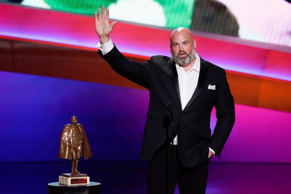 Andrew Whitworth of the Los Angeles Rams receives the NFL Man of the Year Award at the NFL Honors show Thursday, Feb. 10, 2022, in Inglewood, Calif. (AP Photo/Mark J. Terrill)