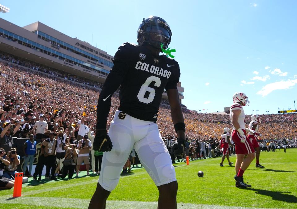 Sep 9, 2023; Boulder, Colorado, USA; Colorado Buffaloes wide receiver Tar'Varish Dawson (6) reacts to his touchdown reception in the second quarter against the Nebraska Cornhuskers at Folsom Field. Mandatory Credit: Ron Chenoy-USA TODAY Sports