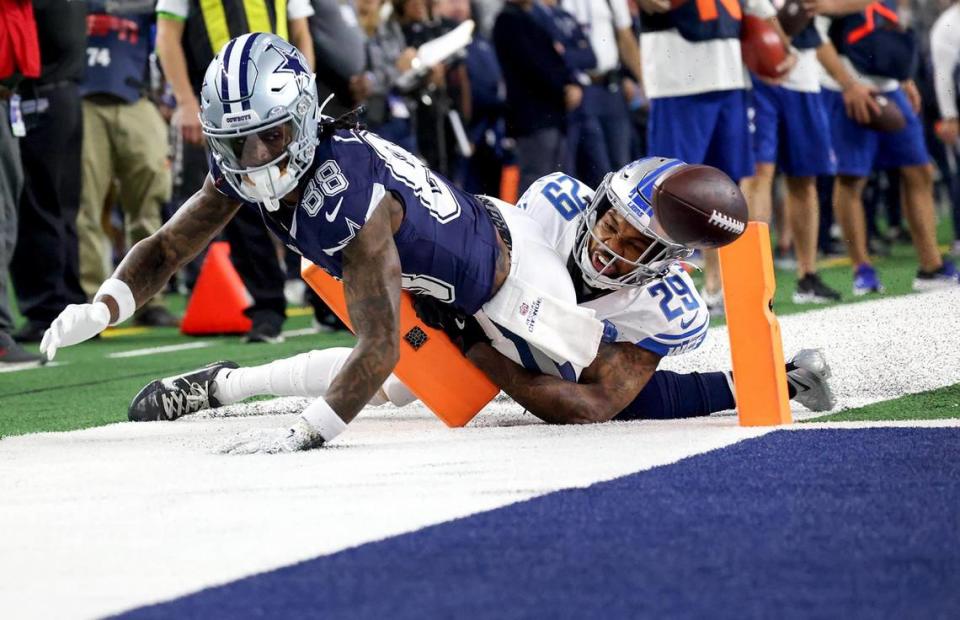 Detroit Lions cornerback Kindle Vildor tackles Dallas Cowboys wide receiver CeeDee Lamb, forcing a fumble and a touchback during the second quarter on Saturday, December 30, 2023.