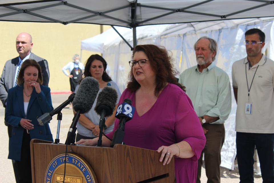Casa Alitas Executive Director Teresa Cavendish speaks at a news conference outside of the Casa Alitas Drexel Center in Tucson on May 9, 2023.