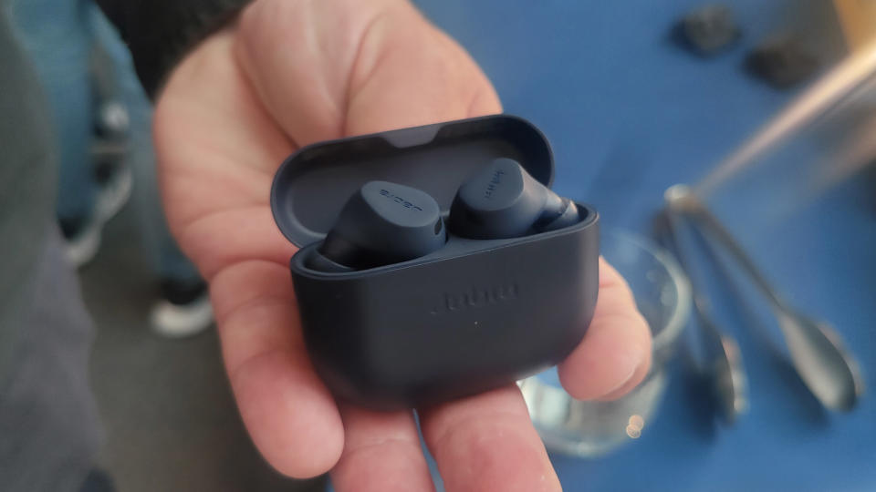 Jabra Elite 8 Active held in a man's hand