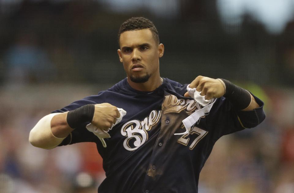 Carlos Gomez isn't afraid to take big cuts at the plate, no matter the pitch count. (AP) 