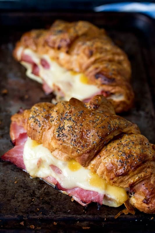 <p>Kitchen Sanctuary</p><p>Ham and cheese croissant with honey mustard glaze—a simple but delicious Mother's day's brunch.</p><p><strong>Get the recipe: <a href="https://www.kitchensanctuary.com/ham-cheese-croissants-honey-mustard-glaze/" rel="nofollow noopener" target="_blank" data-ylk="slk:Ham and Cheese Croissants with Honey Mustard Glaze;elm:context_link;itc:0;sec:content-canvas" class="link rapid-noclick-resp"><em>Ham and Cheese Croissants with Honey Mustard Glaze</em></a></strong></p>