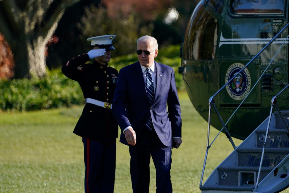 President Joe Biden walks off of Marine One on the South Lawn of the White House in Washington, Friday, Nov. 19, 2021, after returning from Walter Reed National Military Medical Center for his annual physical.