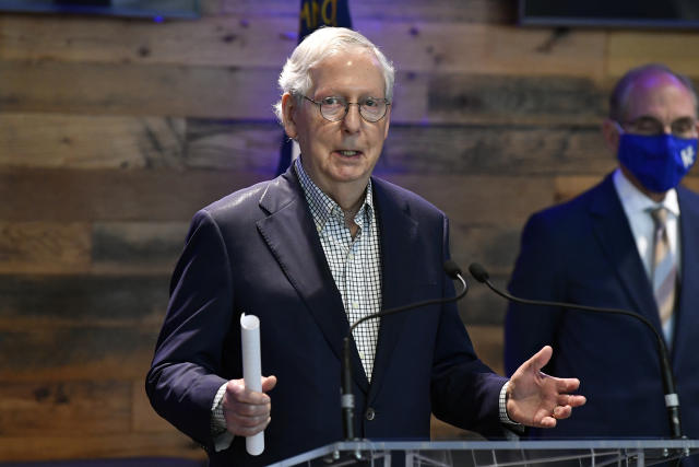 Senate Minority Leader Mitch McConnell, R-Ky., addresses the media at a COVID-19 vaccination site in Lexington, Ky., Monday, April 5, 2021. (AP Photo/Timothy D. Easley)