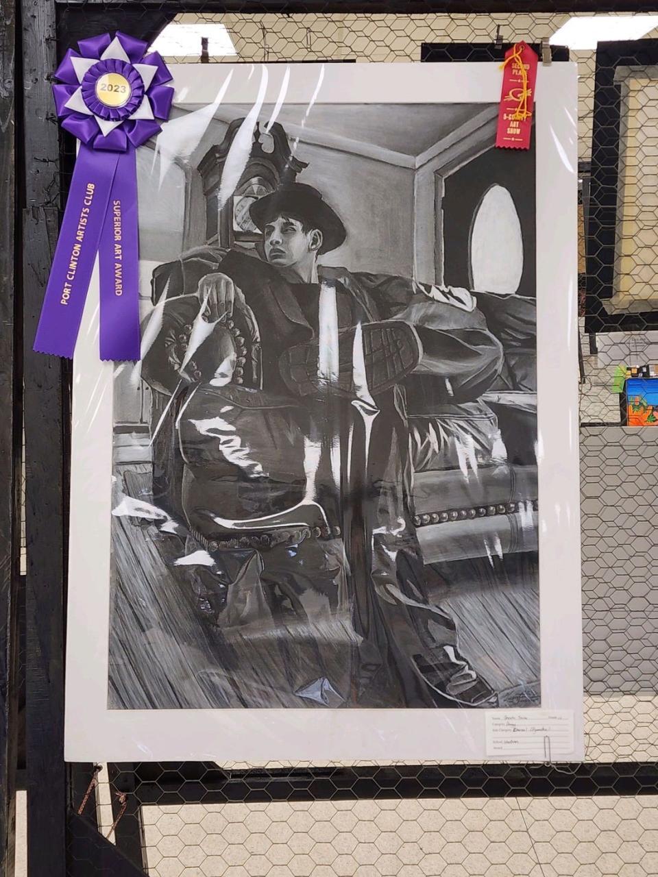 Quentin Trevino, a Woodmore High School, received a Superior award for his charcoal drawing.