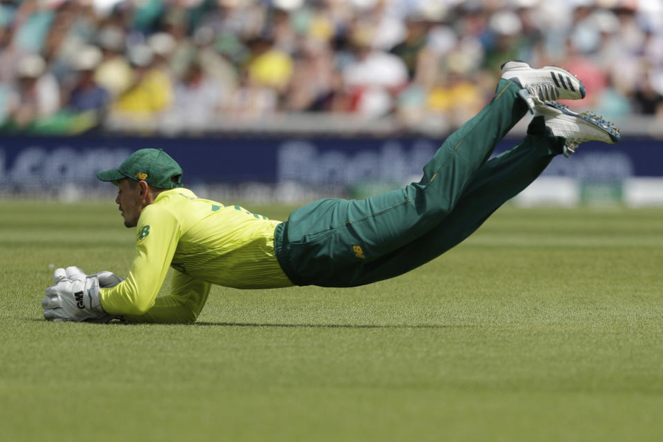 South Africa's Quinton de Koc catches out Bangladesh's Soumya Sarkar during the Cricket World Cup match between South Africa and Bangladesh at the Oval in London, Sunday, June 2, 2019. (AP Photo/Matt Dunham)