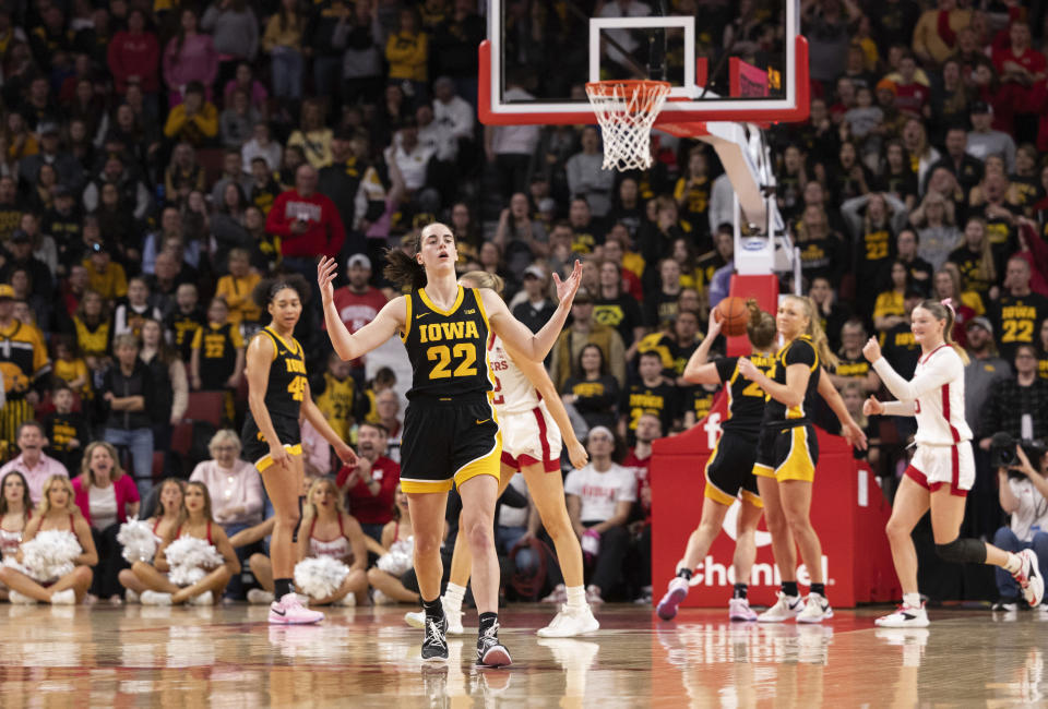 Iowa's Caitlin Clark (22) reacts after being called for a foul against Nebraska during the second half of an NCAA college basketball game Sunday, Feb. 11, 2024, in Lincoln, Neb. (AP Photo/Rebecca S. Gratz)