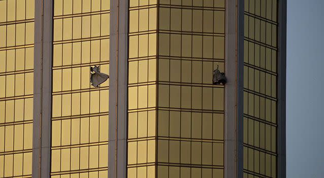 Drapes billow from two broken windows at the Mandalay Bay Resort and Casino on the Las Vegas Strip on Oct. 2, 2017. Source: John Locher/AP