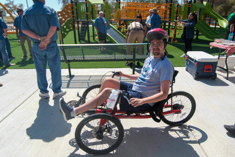 Jody Morris rides his new AMtryke Thursday at the newly built Kylie Hiner Memorial Park in Canyon.