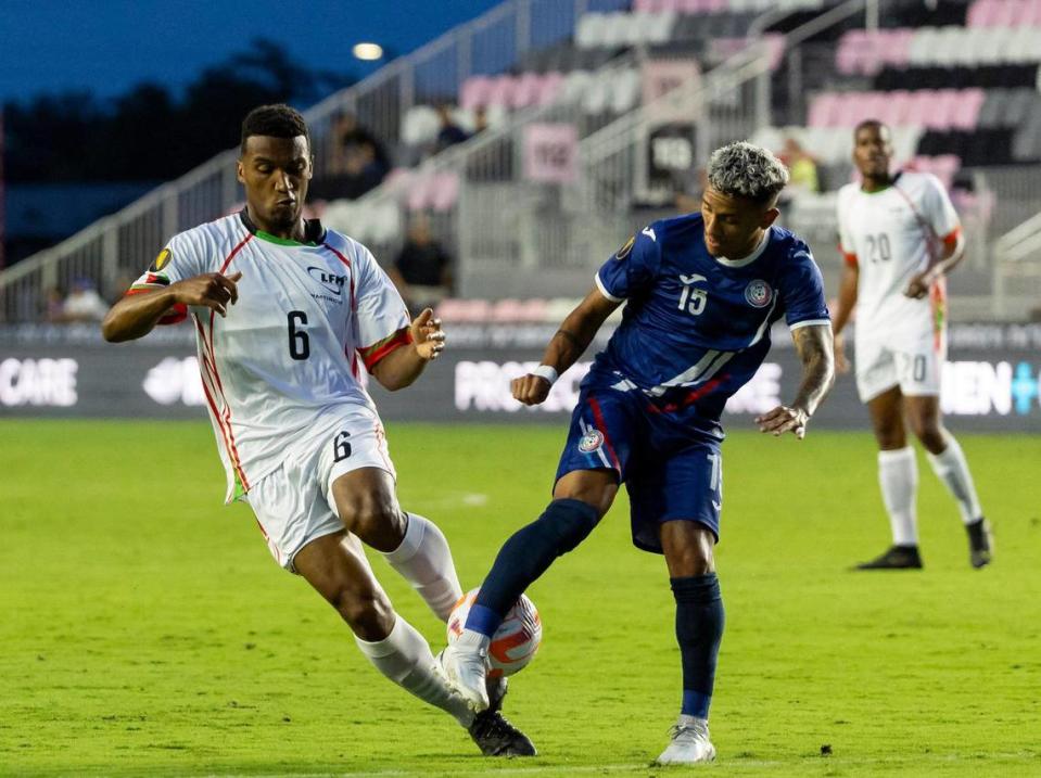 Puerto Rico midfielder Devin Vega (15) recovers the ball from Martinique midfielder Jonathan Mexique (6) in the first half of their CONCACAF Gold Cup 2023 preliminary match at DRV PNK Stadium on Tuesday, June 20, 2023, in Fort Lauderdale, Fla.