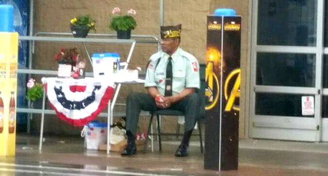 Manuel Griffin was kept from sitting under an awning during his rainy-day fundraising efforts in front of a Walmart recently. (Photo: Maryann Griffin via Facebook)